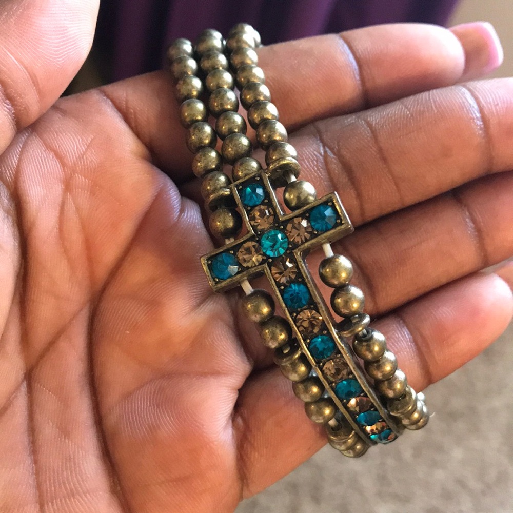 Gold and blue cross bracelet